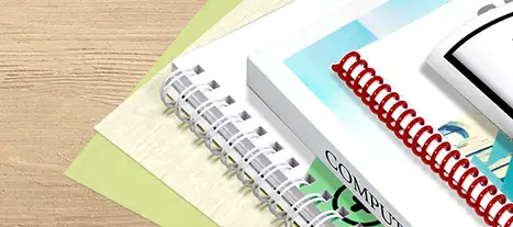 Printed books on a desktop