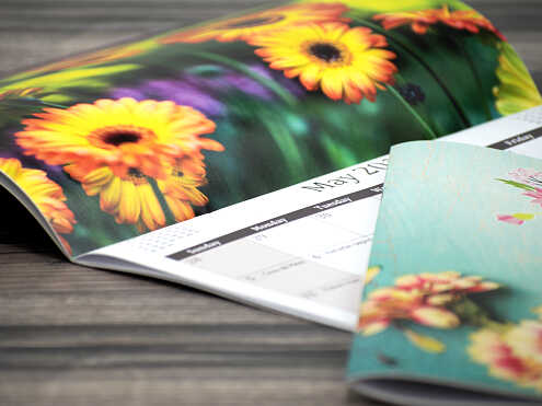 Custom stapled calendars with saddle stitch binding
